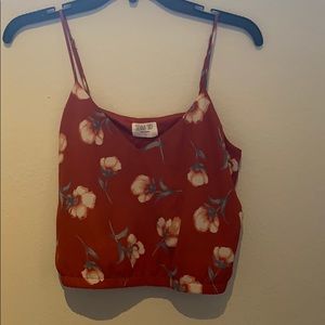 Orange cropped floral shirt